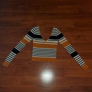 Cropped long sleeve sweater